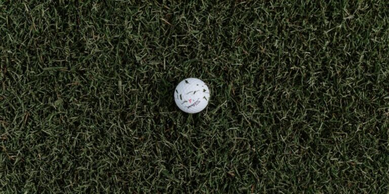 What causes too much spin on a golf ball?